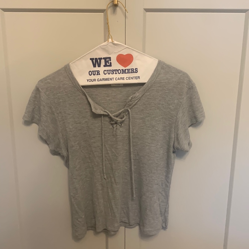 Grey tshirt. John Galt.  unsure size but seems like S/M